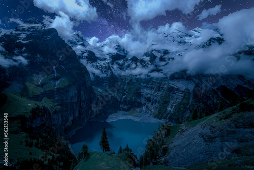 Starry Night at Oeschinensee: Beautiful Swiss Alps Landscape with Famous Lake and Milky Way