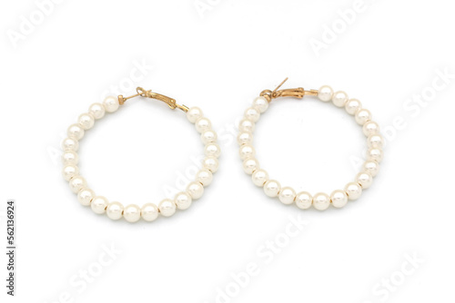 Elegant earrings, a pair of fashion earrings on white isolated background. Accessory earrings for women.