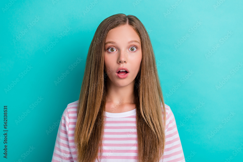 Photo of impressed schoolgirl staring cant believe open mouth isolated on aquamarine color background - obrazy, fototapety, plakaty 