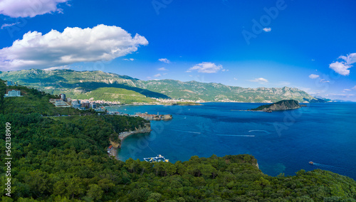 Panorama of bird s eye view of towns of Budva and Becici with hotels and beaches near Adriatic Sea against the backdrop of the Montenegrin Mountains