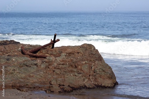 rusty anchor on the beach