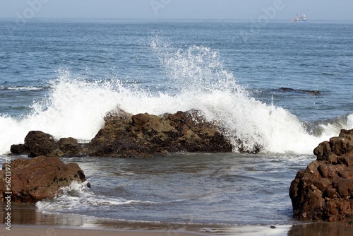 waves crashing on rocks