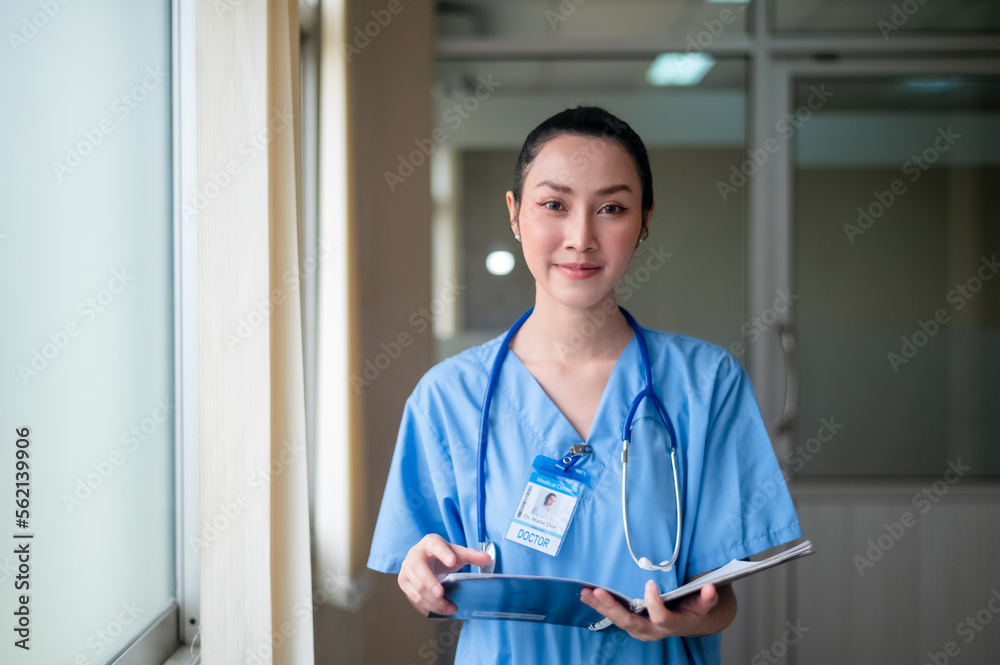 Asian woman nurse working folder document in hospital Asian woman nurse working folder document in hospital