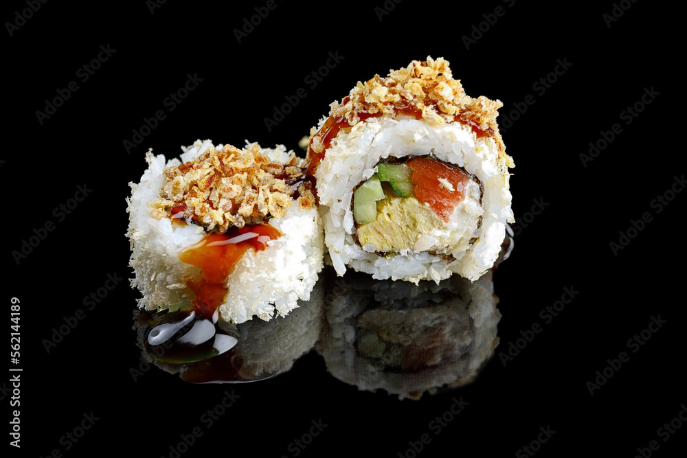 Sushi roll with smoked salmon, cucumber and cream cheese