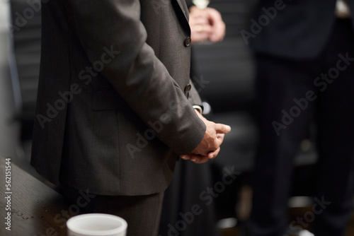 The man in a suit. Businessman's hands close up. 