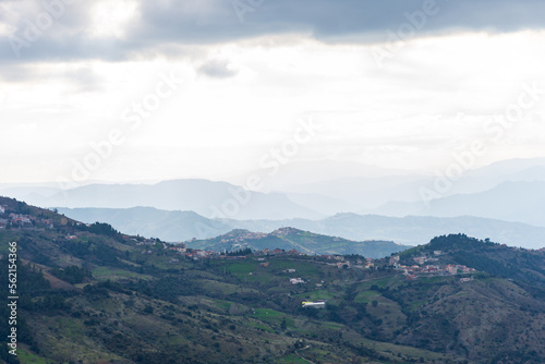 Scenic view of a village on the top of the mountain on a cloudy day. © Hamdi Bendali