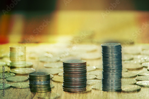 Saving money concept preset  putting money coin stack growing business photo