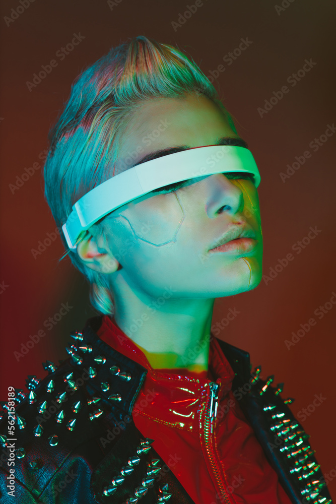 Representation of a bionic super human with advanced technology parts as vr visors and gadgets playing in a mixed reality training room. Futuristic cyberpunk evolution of human mankind and AI - obrazy, fototapety, plakaty 