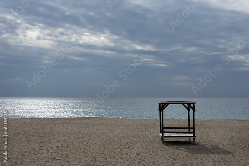 gazebo on the beach at sunset on a cloudy day. High quality photo © Margo_Alexa