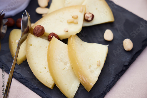 Portuguese cheese. Plate with pieces of cheese from Sierra de la Estrella