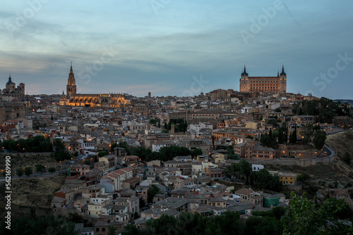 General view of Toledo, Spain, from viewpoint of the valley during the sunset with the cathedral and the fortress on the top of skyline