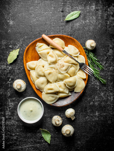Dumplings with mushrooms and sour cream.
