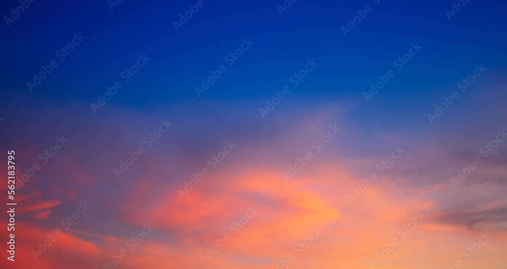 Clouds and orange sky,Real amazing panoramic sunrise or sunset sky with gentle colorful clouds. Long panorama, crop it
