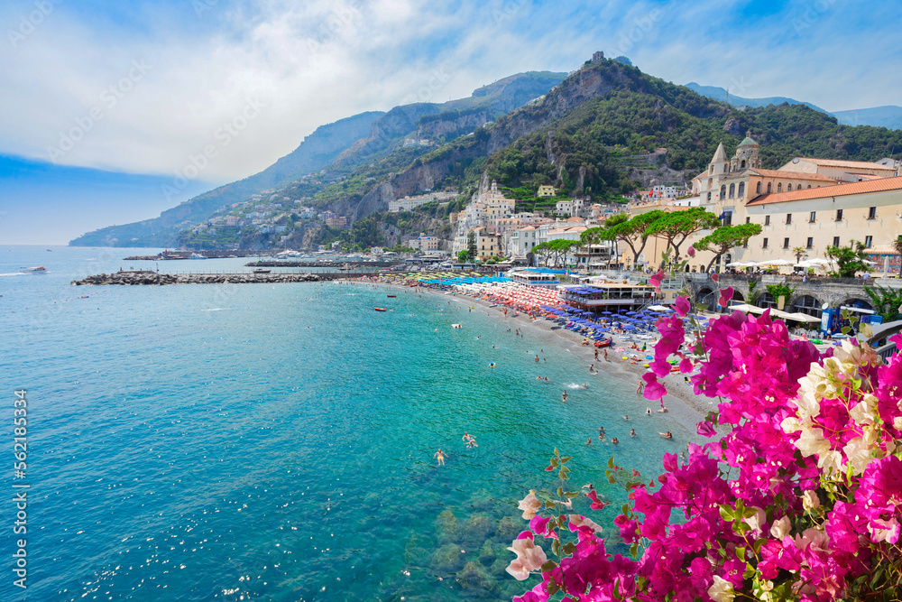 Fototapeta premium Amalfi town and summer beach with clean blue water and flowers , Italy