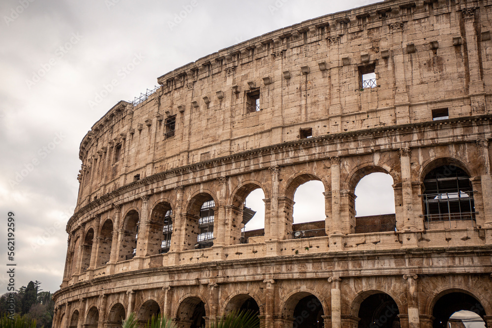 Roman Colosseum from outside in cloudy day, in Rome, in Italy