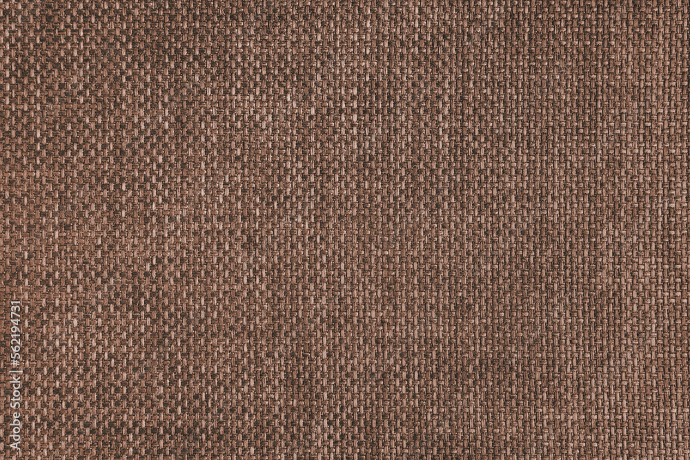 Jacquard woven upholstery, brown coarse fabric texture. Textile background, furniture textile material, wallpaper, backdrop. Cloth structure close up. Jacquard woven upholstery, brown coarse fabric texture. Textile background, furniture textile material, wallpaper, backdrop. Cloth structure close up.