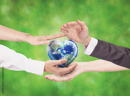 Hands holding Heart shape globe earth with green blur light pastel background, Friendly World Sustainable Environment Natural Day and Save our Earth Concept