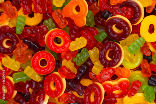 Assorted colorful gummy candies. Jelly donuts. Jelly bears.