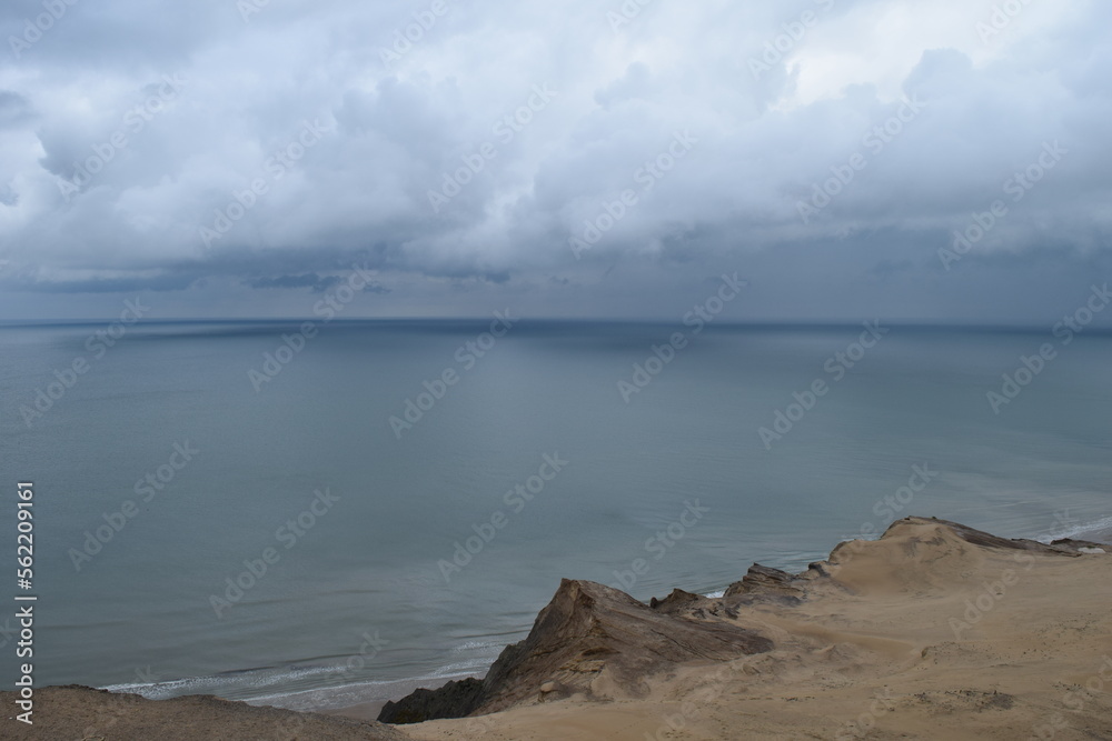 View of the approaching rain over the North Sea from Rubjerg Knude Lighthouse; Denmark; North Judeland