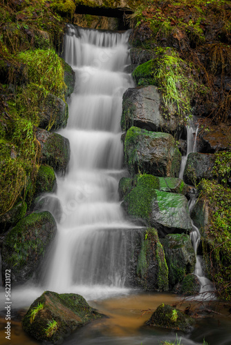 Feldaist river in valley near Rainbach im Muhlkreis in winter day with waterfall