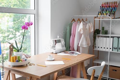 Tailor's workplace with sew...