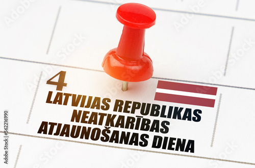 On the calendar grid, the date and name of the holiday -Day of Restoration of Independence of the Republic of Latvia photo