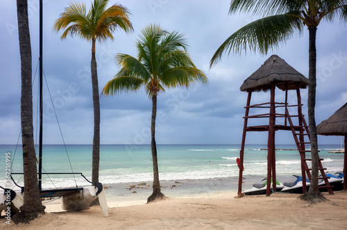 Caribbean beach just before a tropical storm. © MaciejBledowski