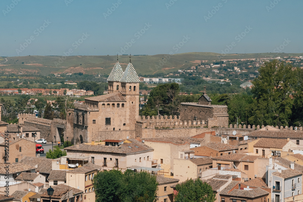 Segovia, España. April 29, 2022: Walls of Toledo and alpha tower with urban landscape.