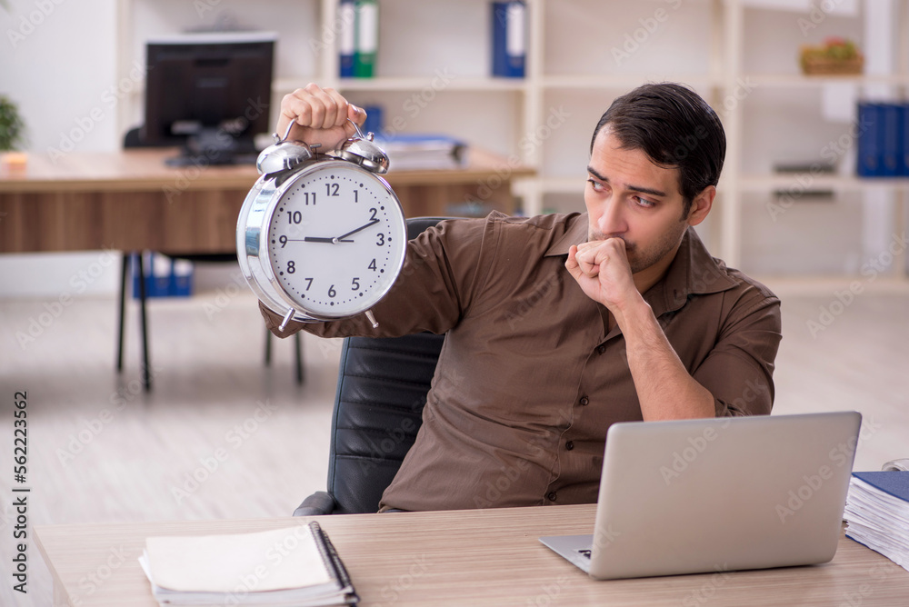 Young attractive employee sitting in the office Young attractive employee sitting in the office