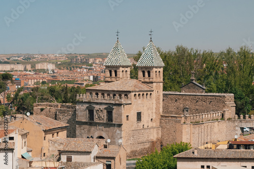 Segovia, España. April 29, 2022: Walls of Toledo and alpha tower with urban landscape.