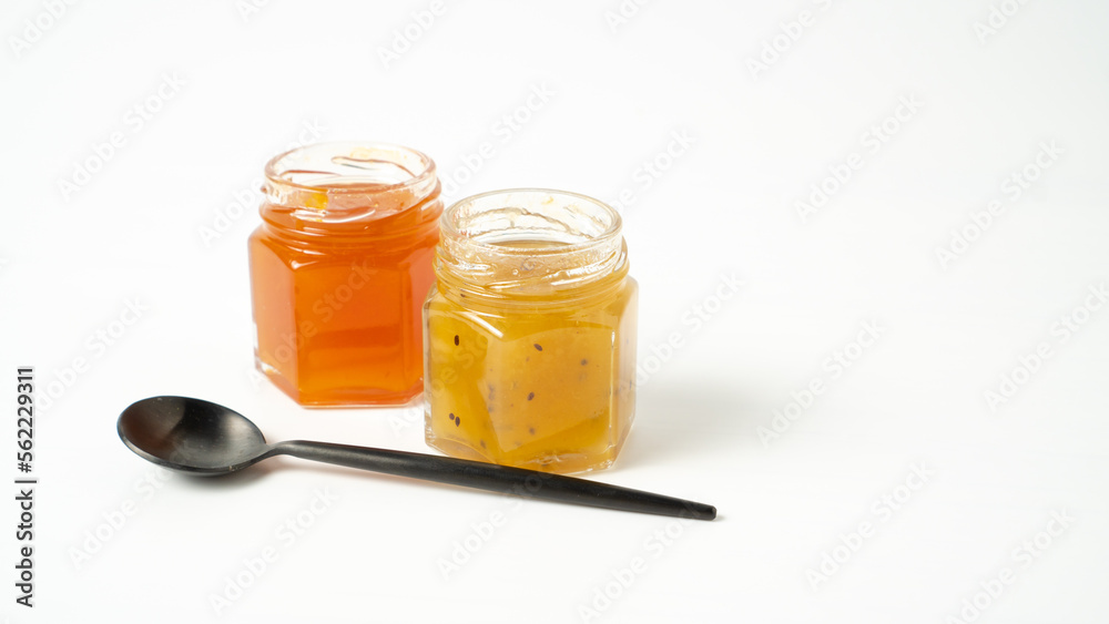 Two isolated jam jars on white background. Delisious jam. Jam containers with space for text