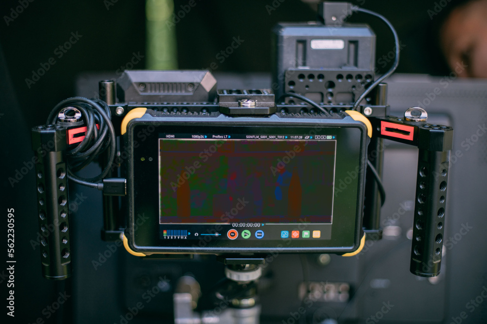 Fototapeta premium Film crew, lighting devices, monitors, playbacks - filming equipment and a team of specialists in filming movies