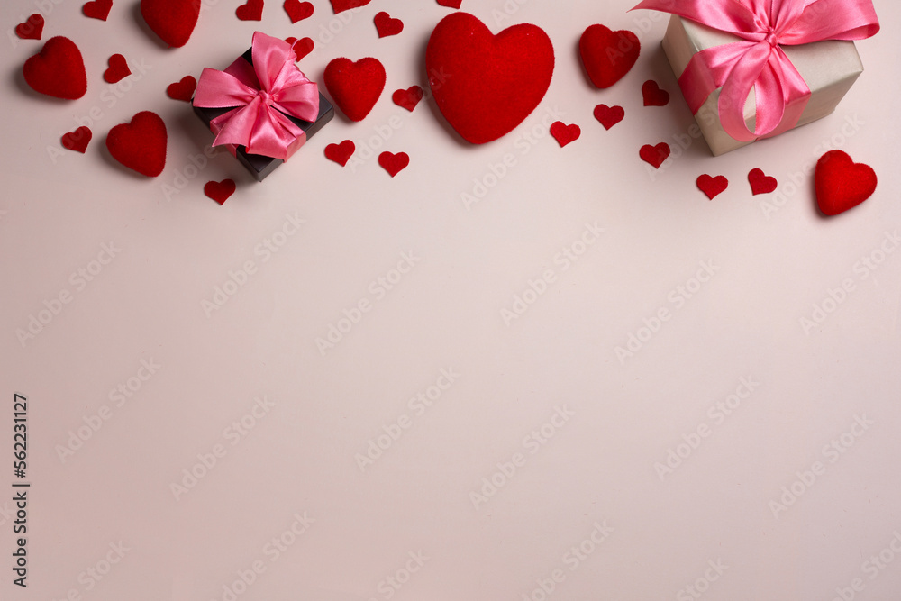 Valentine's day background. Pastel banner with red hearts and gift with ribbon. Place for text.