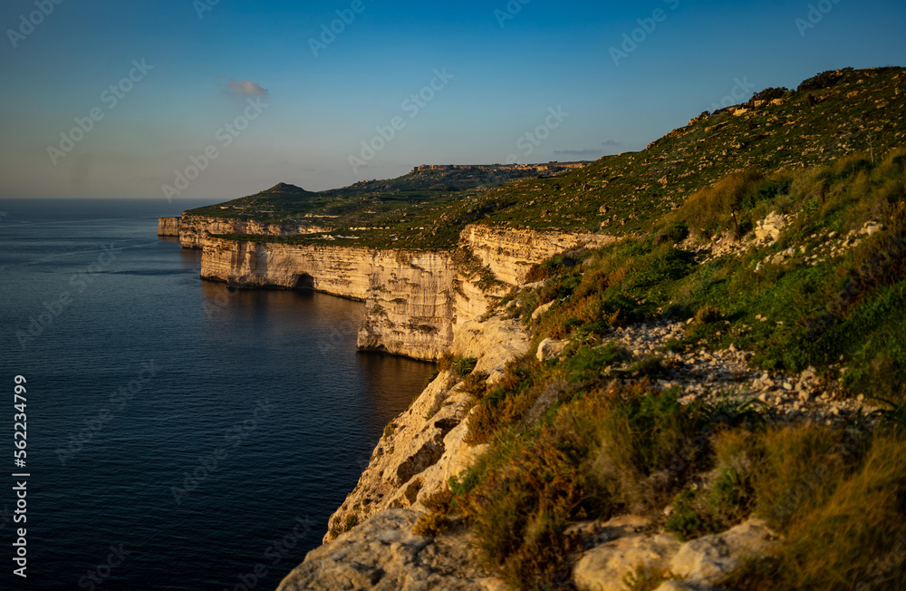 Beautiful cliffs of Ras id-Dawwara, sunset time in Malta Beautiful cliffs of Ras id-Dawwara, sunset time in Malta