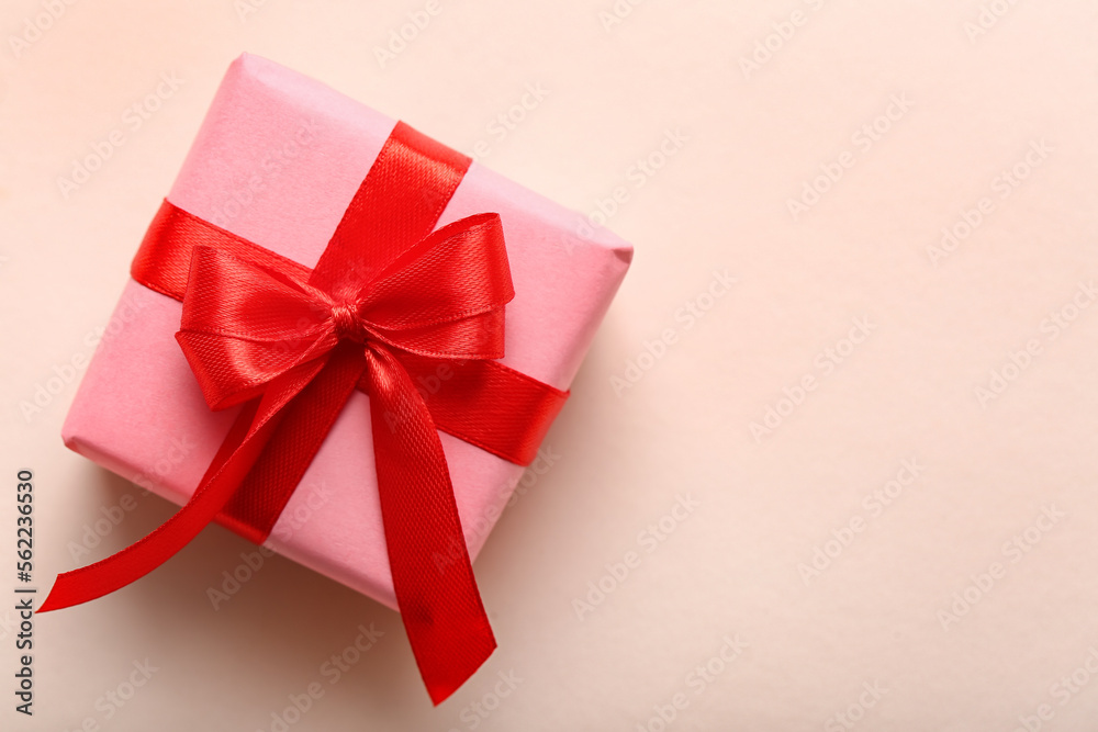 Beautiful gift with red ribbon on white background. Valentine's Day celebration Beautiful gift with red ribbon on white background. Valentine's Day celebration