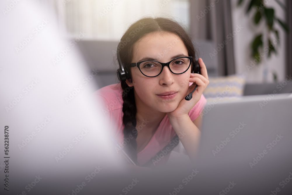 Young female Student doing complicated homework online Young female Student doing complicated homework online