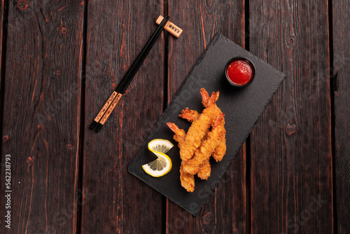 Fried Shrimps tempura with sweet chili sauce - asian japanese food top view photo