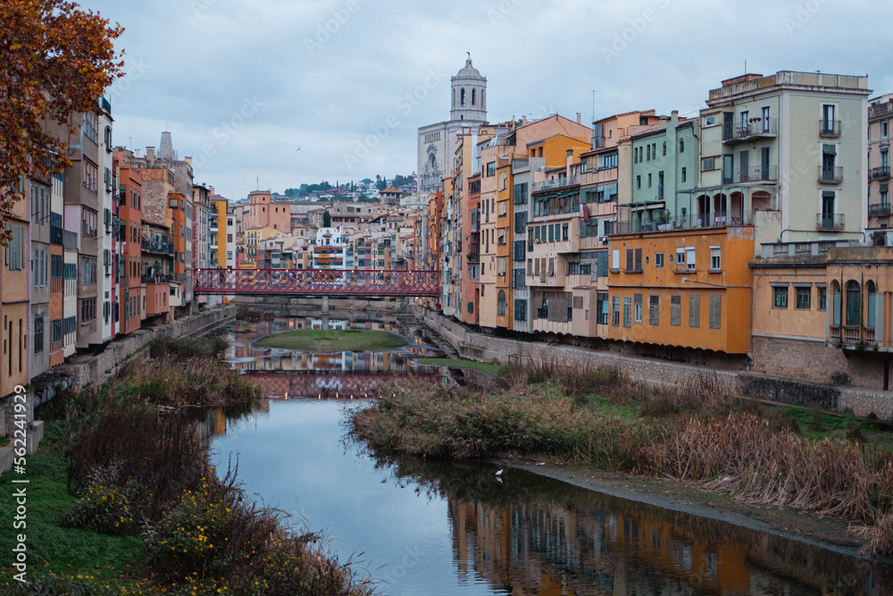Girona city skyline with famous Cathedral landmark on a cloudy winter day