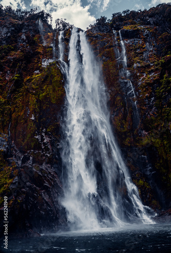 Closeup Of Mountain Waterfall Cascading Into Water at Sterling Falls  Milford Sound in Fiordland National Park  New Zealand 2