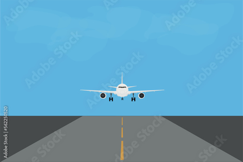 the plane lands on the runway at the airport