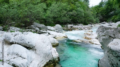 Flying Above Idyllic Emerald Soča River, Stream that Floats Through Small Soča Gorge Located in Bovec Surrounded With Huge Stones, Rocks, River Gorge, Forest.