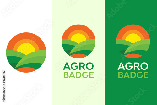 Sunrise over plowed planting hills logo badge