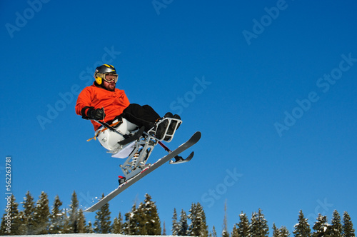 A handicap skier in air.