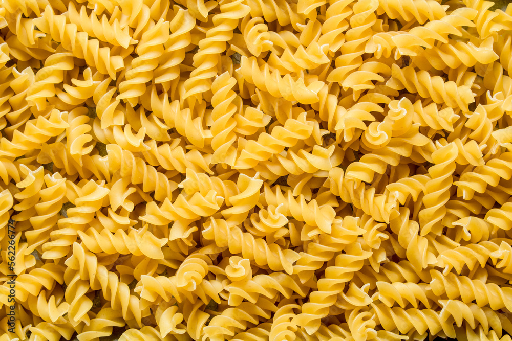 Pasta background. Dry pasta fusilli. Pasta background. Dry pasta fusilli.