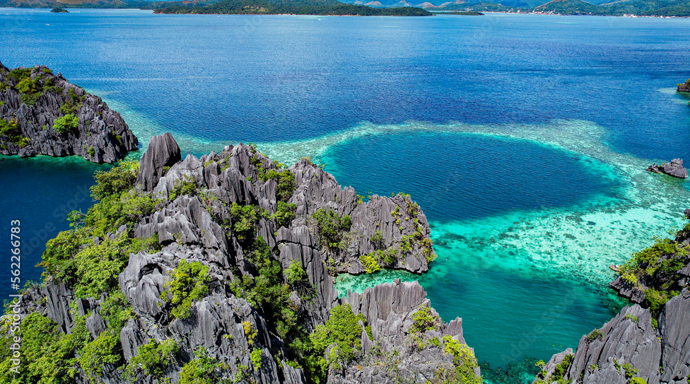 Aerial Drone Image of Karst Cliffs in Turquoise Water at Famous Twin Lagoon, Coron, Palawan, Philippines 2