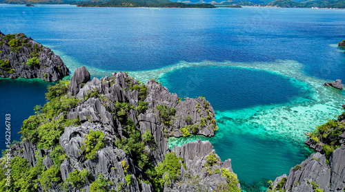 Aerial Drone Image of Karst Cliffs in Turquoise Water at Famous Twin Lagoon  Coron  Palawan  Philippines 2