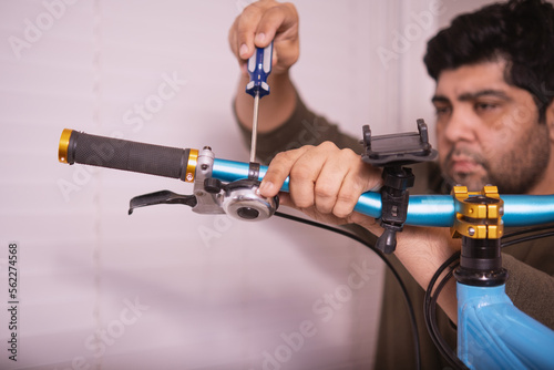 Man mounting a bike bell