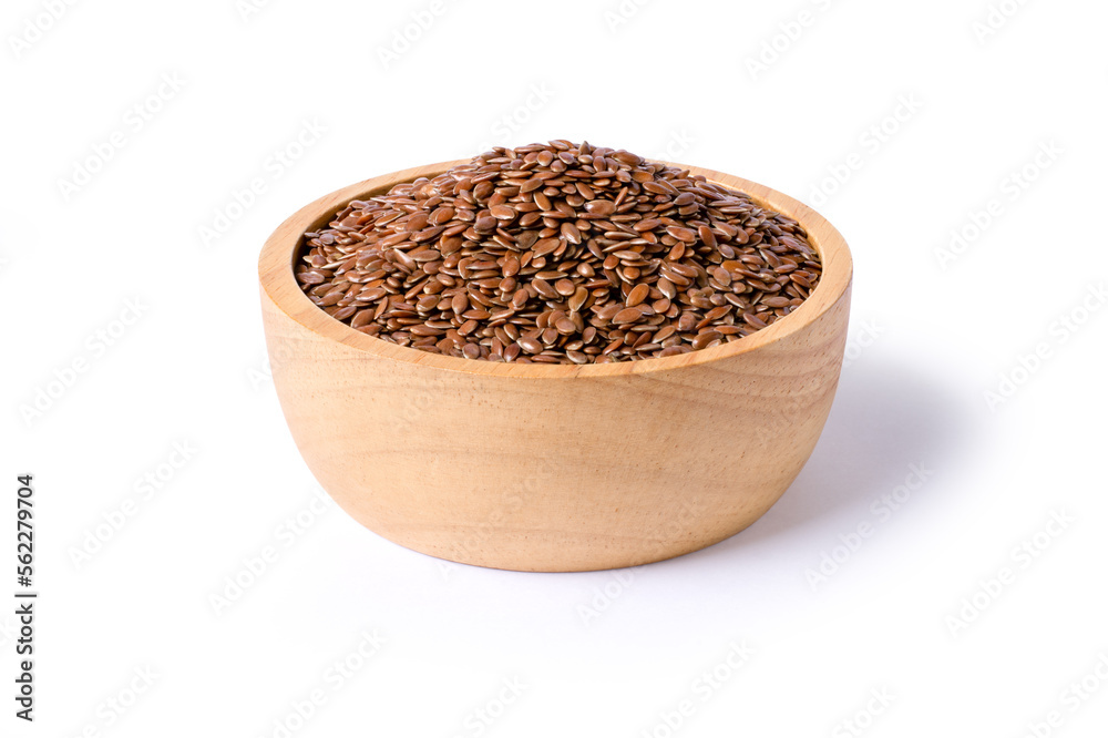 Flax seeds in wooden bowl isolated on white background with clipping path. Flax seeds in wooden bowl isolated on white background with clipping path.