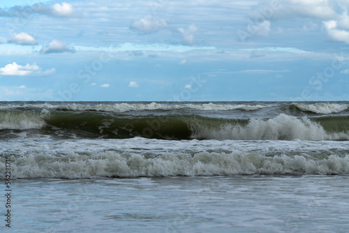 Fototapeta Naklejka Na Ścianę i Meble -  View of the incoming wave on the Baltic Sea on the shore of the Curonian Spit on a summer day, Kaliningrad region, Russia