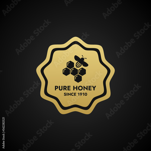 Pure honey label vector or Pure honey stamp vector on black background. Best Pure honey label for packaging. Best original honey label or stamp is useful for proving the authenticity of item.